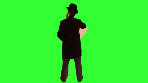 Victorian man standing with plans back Greenscreen Stock Footage 79884938