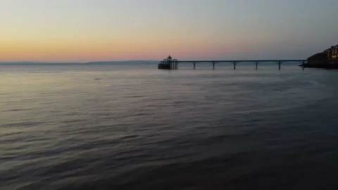 Victorian Pier sunset with bird Drone Shot over sea Clevedon Video stock 196889821