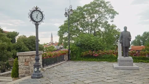 Victorian post clock and Holy Mother of God Cathedral, Plovdiv Old Town Stock Footage 346862506