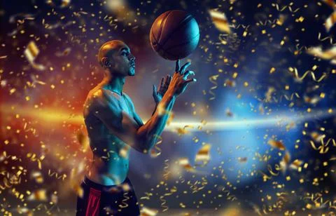Victory. Beautiful african-american male basketball player with ball in neon Stock Photos
