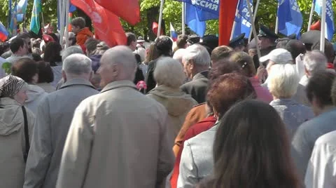 Victory Day. Column of people with flags moving in 1200 to the memorial guards Stock Footage 10979454