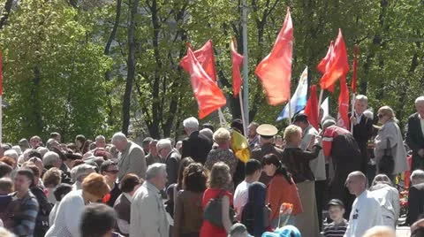 Victory Day. Communists with red flags at the memorial 1200 guards Stock Footage 10979438