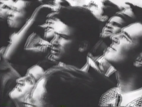 A victory parade through Tunis includes troops, vehicles, civilians, General Stock Footage 79460518