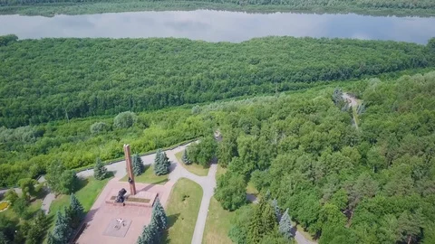 Victory Park with parallel pathways amidst the dense forest Stock Footage 92369369