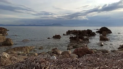 VID 2020Sunset through clouds, cloudy sky and calms sea. The silence 1021 172159 Stock Footage 141740858