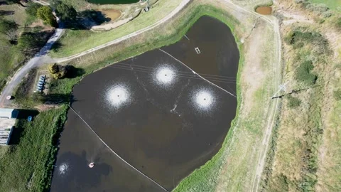 VID - Settling Pond Aerators Stock Footage 231555880