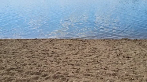 Video in 4K with beach and the water of a lake Stock Footage 282432014