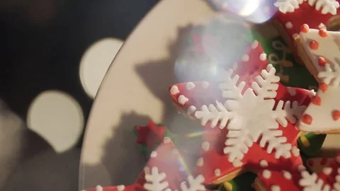 Video 4k, decorating cookies of ginger cake for Christmas. multi-colored cookies Stock Footage 69149513