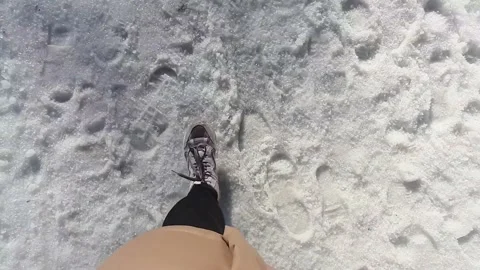 Video about the first person. Flat layout. A woman walks in the snow. Stock Footage 171069540