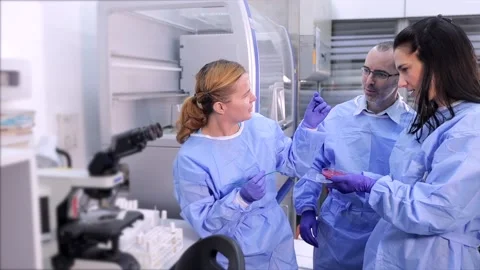 This video is about Three Lab Worker Stock Footage 233345514