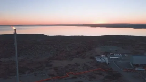 Video of an aerial view of the burned torch in the desert. oil well Stock Footage 159014841