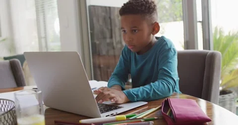 Video of african american boy doing homework Stock Footage 335513184