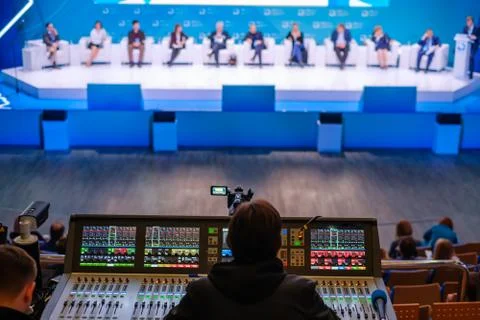 Video and audio engineer working at the event Stock Photos