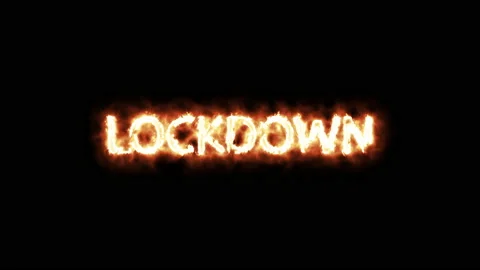 Video animation of the message Text "LOCKDOWN" written with fire on black Stock Footage 143335235