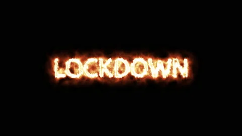 Video animation of the message Text "LOCKDOWN" written with fire on black Stock Footage 143335264