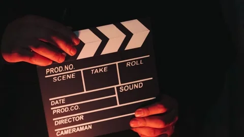 Video of anonymous person using a clapperboard. Stock Footage 261928155