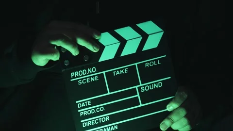 Video of anonymous person using a clapperboard. Stock Footage 261928197