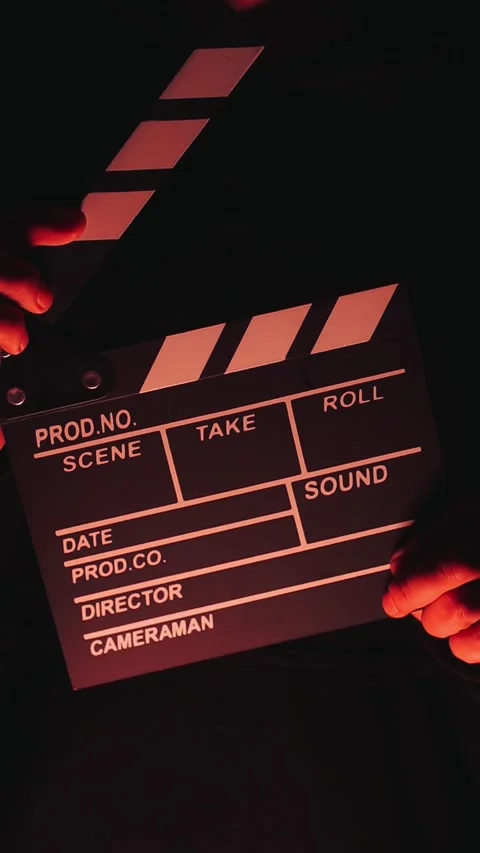 Video of anonymous person using a clapperboard in a local film production. Stock Footage 261929897