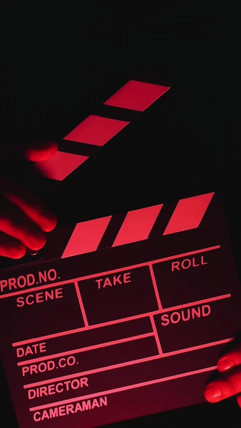Video of anonymous person using a clapperboard in a local film production. Stock Footage 261929899