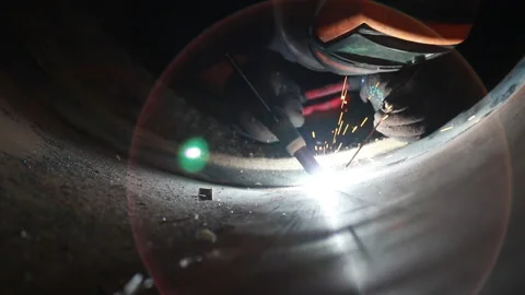 Video of the argon arc welding process inside a large diameter pipe Stock Footage 141729392