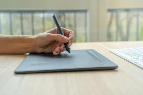 Video artist using graphics tablet. Stock Photos