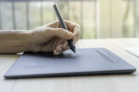 Video artist using graphics tablet. Stock Photos