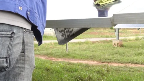 Video on the back, Technicians are doing solar panels with fabric, 스톡 동영상 108075858
