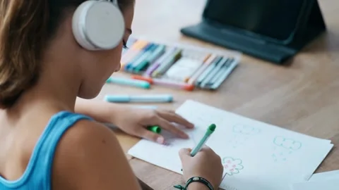 Video of back view of little kind girl listening to music in headphones whi.. Stock Footage 290868667
