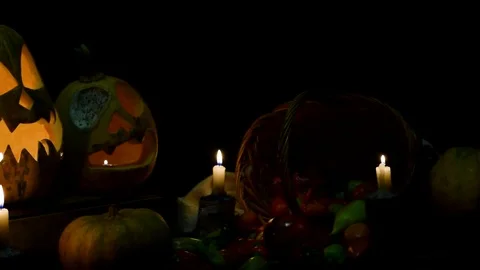Video background for halloween. Three pumpkins with candles Stock Footage 98879347