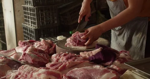 Video of beef being hand-cut at a local market in Vietnam Hanoi. Premium organic Stock Footage 292861242