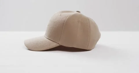 Video of beige baseball cap and copy space on white background 스톡 동영상 331247952