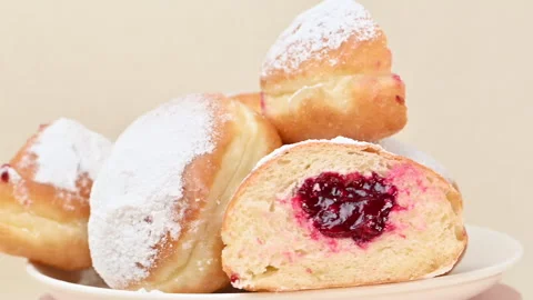 Video of Berliners (German donuts) with raspberry jam Stock Footage 344921900