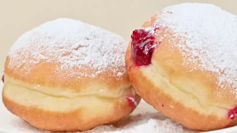 Video of Berliners (German donuts) with raspberry jam Stock Footage 344922771