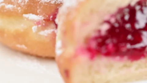Video of Berliners (German donuts) with raspberry jam Stock Footage 344924511