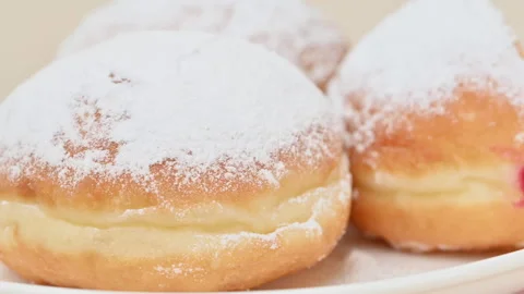 Video of Berliners (German donuts) with raspberry jam Stock Footage 344925144