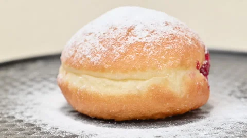 Video of Berliners (German donuts) with raspberry jam Stock Footage 344925357