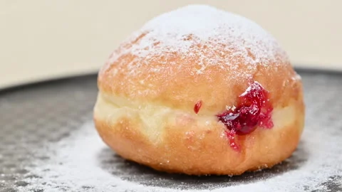 Video of Berliners (German donuts) with raspberry jam Stock Footage 344925798