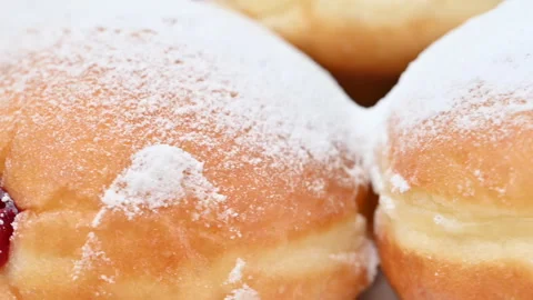 Video of Berliners (German donuts) with raspberry jam Stock Footage 344925880