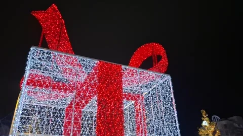 Video with big gift box made by lights. Christmas decorations. 4K Stock Footage 294674539