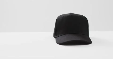 Video of black baseball cap and copy space on white background 스톡 동영상 247354467