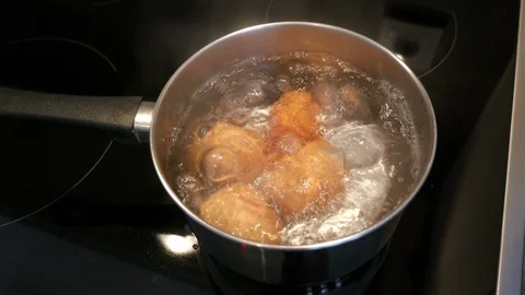 Video of boiling eggs in 4K Stock Footage 86177763