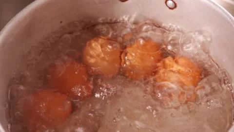 Video of boiling eggs in a pot (close-up). Food preparation concept. Stock Footage 231541130