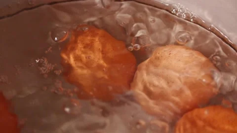 Video of boiling eggs in a pot (close-up). Food preparation concept. Stock Footage 231541137