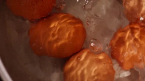 Video of boiling eggs in a pot (close-up). Food preparation concept. Stock Footage 231541151