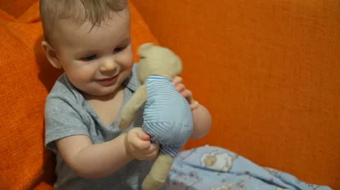 Video boy playing with a toy Stock Footage 61149787