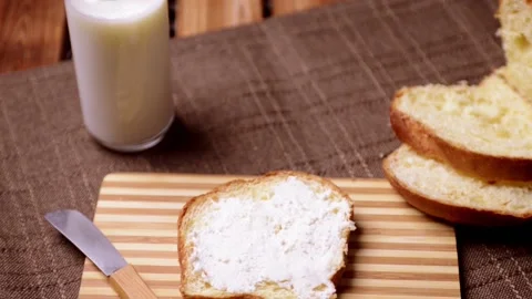 Video bread and chesse spread with glass of milk Stock-Footage 152645796