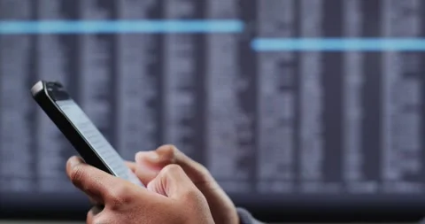Video of businessman using smartphone with data processing in background Video stock 331358808