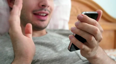 Video Call In Bed With iPhone Stock Footage 27552220