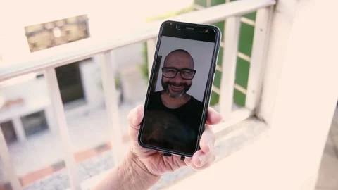 Video call between son and mother during quarentine Stock Footage 137522301