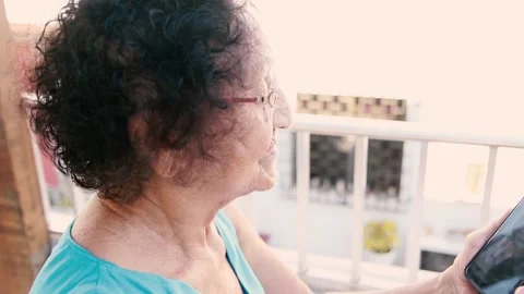 Video call between son and mother during quarentine Stock Footage 137522314